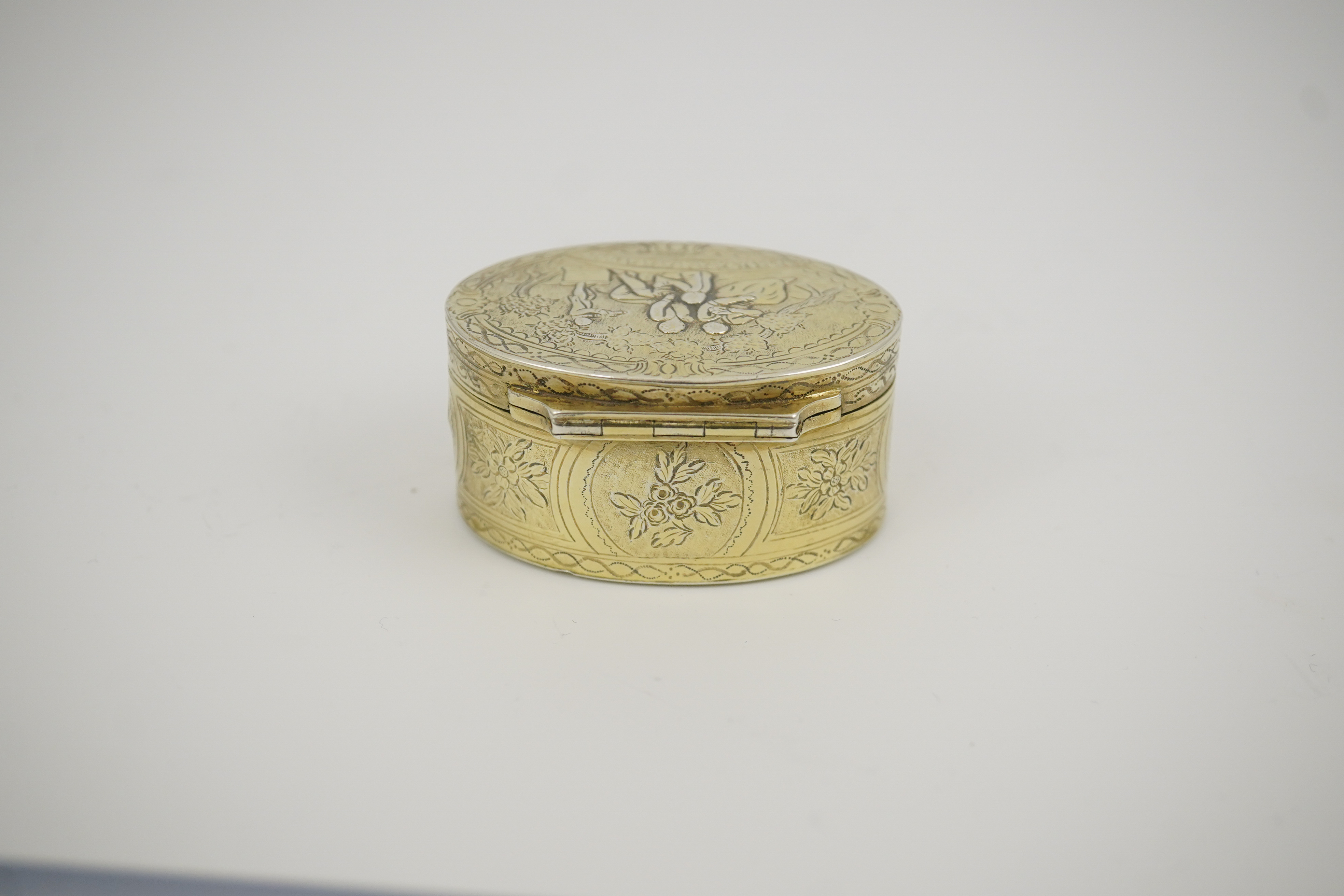 A 19th century Continental silver gilt oval snuff box